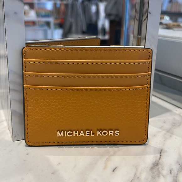 MICHAEL KORS
Large Pebbled Leather Card Holder Case
Cider
NWT - Picture 6 of 16